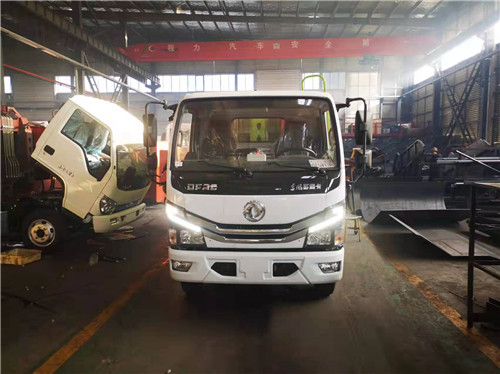 西寧客戶定購國六東風多利卡6方壓縮式垃圾車已發車